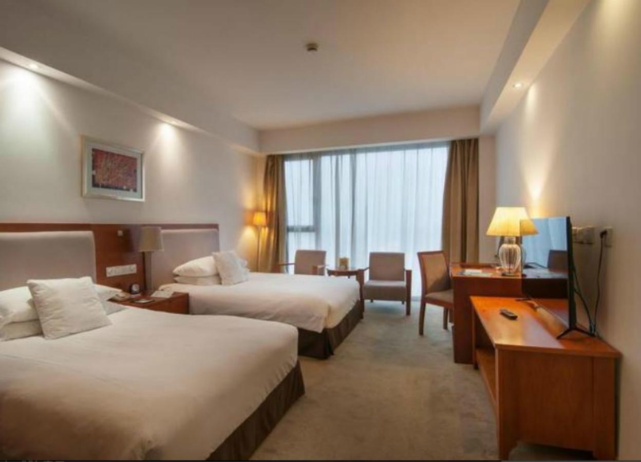 Gloria Plaza Hotel Kangqiao Shanghai Extérieur photo