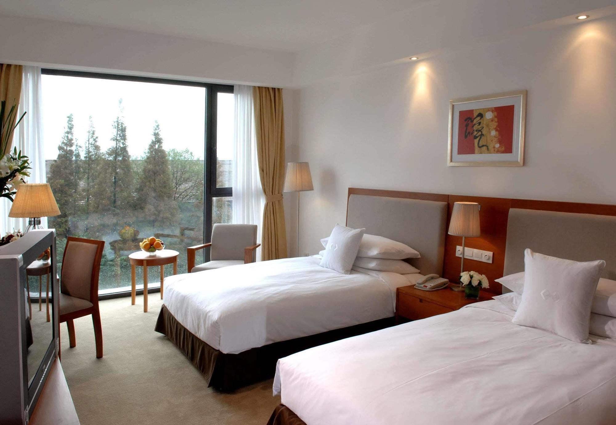 Gloria Plaza Hotel Kangqiao Shanghai Extérieur photo
