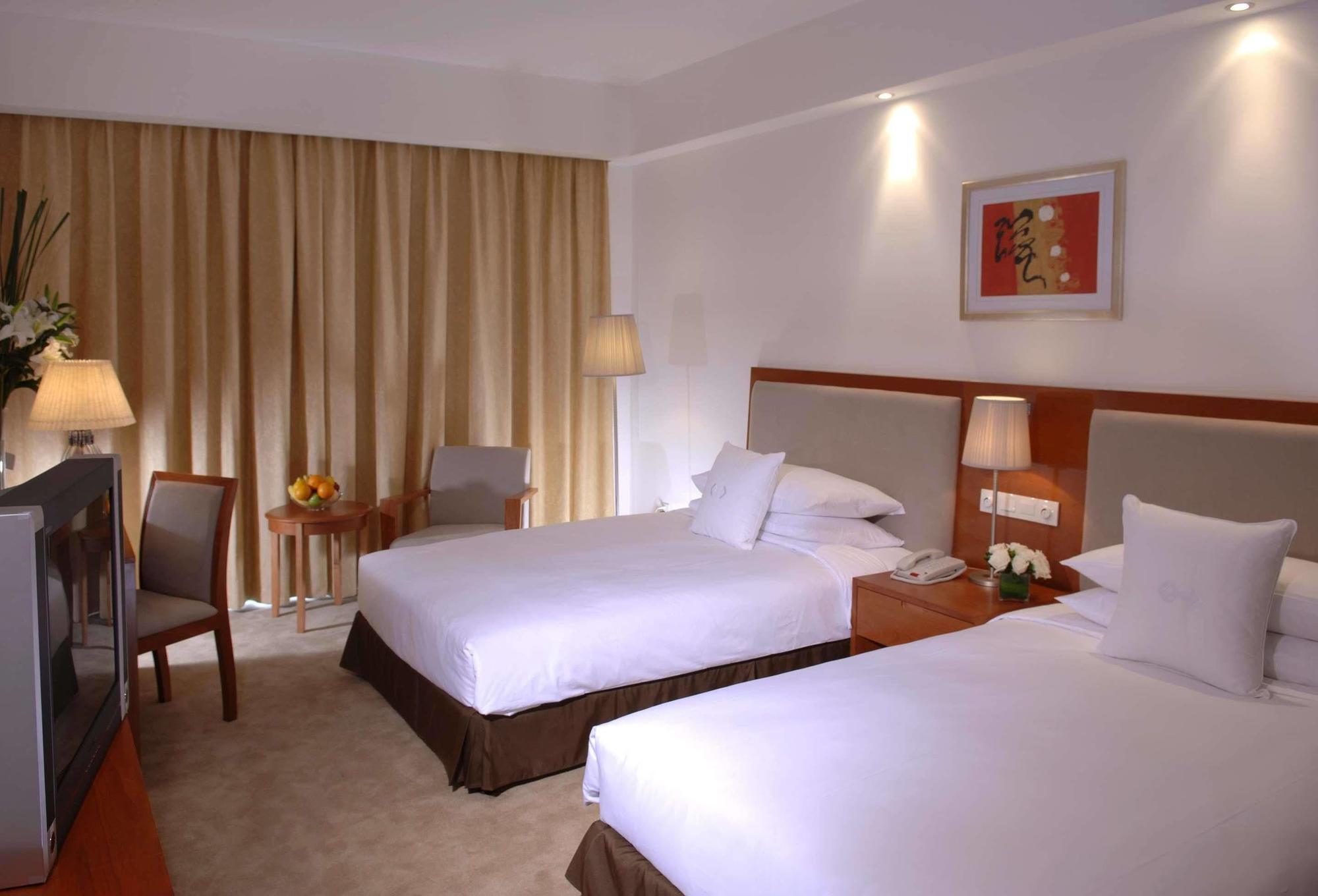 Gloria Plaza Hotel Kangqiao Shanghai Chambre photo